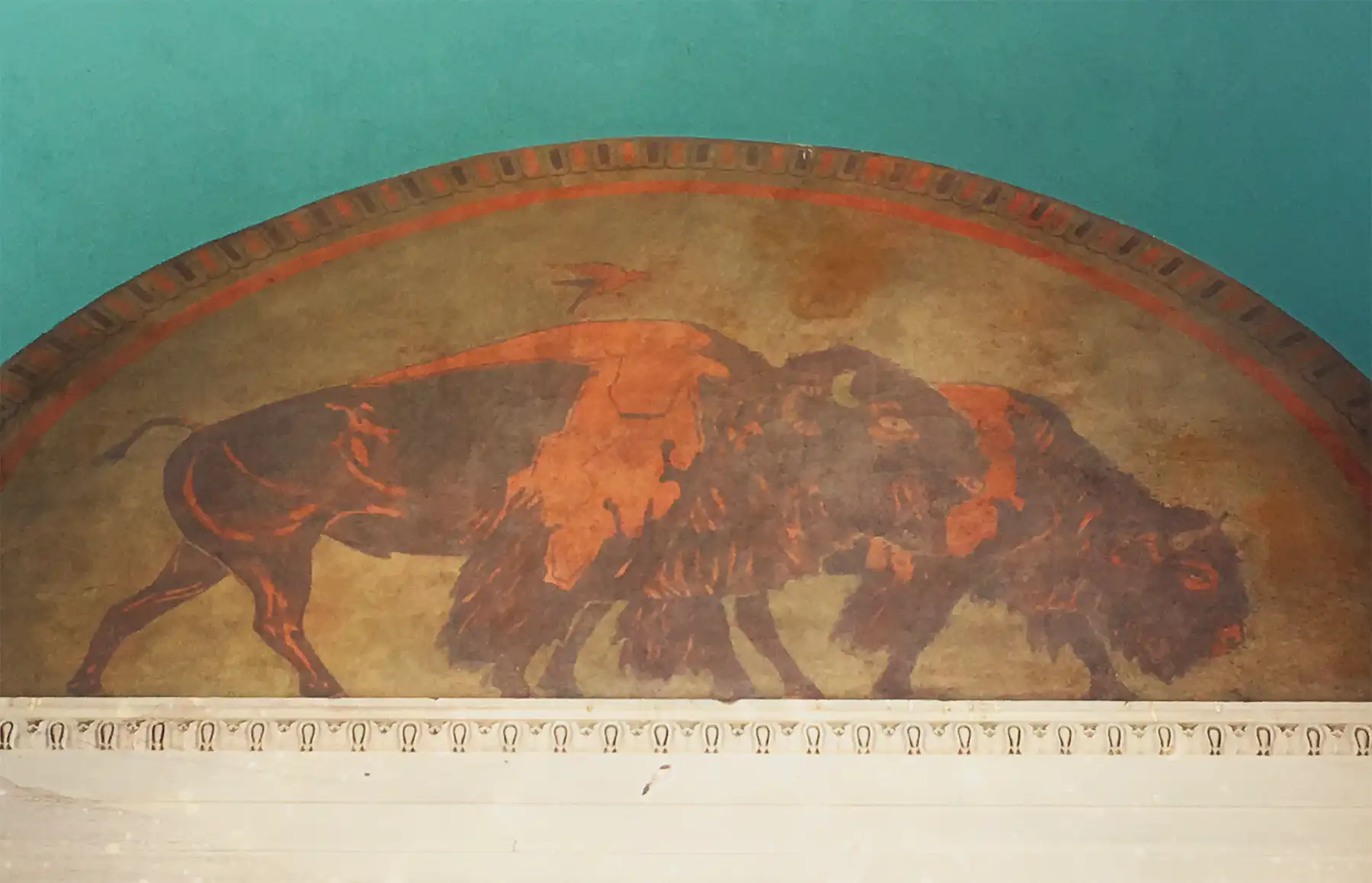 buffalo-mural-voorhies Buffalo mural shows two buffalo in browns and oranges.